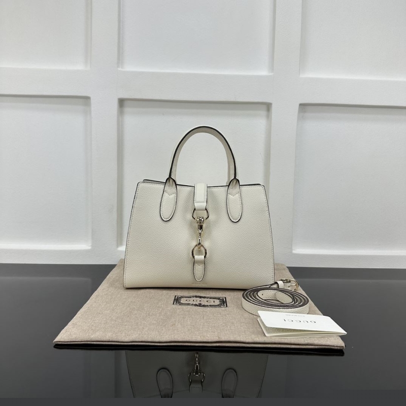 G*u*i top handle bags
